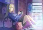  1girl aiz_wallenstein barefoot blonde_hair breasts chips_(food) commentary_request contemporary dungeon_ni_deai_wo_motomeru_no_wa_machigatteiru_darou_ka food food_in_mouth headphones highres long_hair medium_breasts niceumeboshi playing_games potato_chips solo sweater translation_request yellow_eyes 