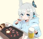  1girl alcohol and_uge beer beer_mug blue_eyes blue_hoodie blush commentary_request cooking cup eating flat_chest food food_art grey_hair griddle hair_ornament hairpods holding holding_food hood hood_down hoodie long_hair long_sleeves looking_at_viewer medium_bangs mug nanashi_inc. open_mouth plate sausage sidelocks simple_background solo table tako-san_wiener terazip toothpick toothpick_holder upper_body virtual_youtuber white_background winding_key x_hair_ornament 