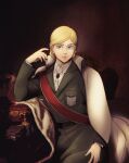  1girl blonde_hair blue_eyes brown_background christa_renz coat coat_on_shoulders commentary_request elbow_rest green_coat hanpetos paradis_military_uniform shingeki_no_kyojin sitting smile solo spanish_commentary 