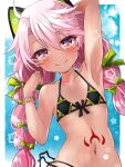  1girl animal_ears arm_behind_head arm_up armpits bare_shoulders bead_bracelet beads bikini black_bikini blush bracelet braid breasts cat_ears chloe_von_einzbern chloe_von_einzbern_(swimsuit_avenger) collarbone dark-skinned_female dark_skin fake_animal_ears fate/grand_order fate_(series) flower green_bikini hair_between_eyes hair_flower hair_ornament hair_ribbon hairband highres jewelry long_hair looking_at_viewer low_twin_braids mochi_(k620803n) navel orange_eyes pink_hair ribbon small_breasts smile solo stomach_tattoo swimsuit tattoo twin_braids two-tone_bikini 