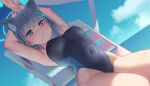  1girl aekun_cben animal_ear_fluff animal_ears armpits arms_up beach_chair blue_archive blue_eyes blue_sky blurry blush breasts cloud cloudy_sky competition_school_swimsuit covered_navel cross_hair_ornament depth_of_field dutch_angle earrings from_below grey_hair groin hair_ornament halo highleg highleg_swimsuit highres jewelry large_breasts looking_down mismatched_pupils ocean outdoors parted_lips school_swimsuit shiroko_(blue_archive) shiroko_(swimsuit)_(blue_archive) sitting sky solo stretching swimsuit wet wet_clothes wet_swimsuit wolf_ears wolf_girl 