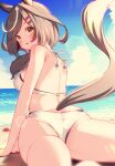  1girl absurdres animal_ears ass beach bikini blush breasts crab hair_ornament hairclip highres horse_ears horse_girl horse_tail lens_flare looking_at_viewer looking_back lying matikane_tannhauser_(umamusume) medium_breasts ocean open_mouth ponta_(1859ysmssstsp) sky solo swimsuit tail umamusume yellow_eyes 