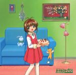  :3 bow brown_hair cake cardcaptor_sakura child dress flower food green_bow green_eyes hairband highres indoors kero kinomoto_sakura official_art open_mouth red_dress red_hairband short_hair stuffed_animal stuffed_toy wings 