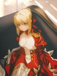  1girl blonde_hair braid breasts cleavage closed_mouth dappled_sunlight dress epaulettes fate/grand_order fate_(series) floor fov_ps french_braid green_eyes hair_between_eyes hair_intakes hair_ribbon indoors juliet_sleeves large_breasts long_sleeves looking_at_viewer nero_claudius_(fate) nero_claudius_(fate/extra) puffy_sleeves red_dress red_ribbon ribbon sidelocks sitting smile solo sunlight 