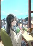  1girl animal black_hair blanket cat cup flower highres holding holding_cup horizon knit_sweater kotatsu long_hair ocean original parted_lips purple_eyes sitting solo soragane_(banisinngurei) sweater tabby_cat table white_sweater 