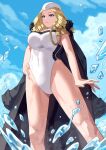  1girl blank_stare blonde_hair blue_eyes chain cloud coat gold_chain hand_on_own_hip highres kolin leotard looking_at_viewer ocean official_alternate_costume solo street_fighter street_fighter_v yagi2013 