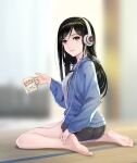  1girl ass barefoot black_hair black_shorts blue_jacket blurry blurry_background breasts commentary_request depth_of_field eyelashes feet fukukitaru full_body grey_eyes hair_ornament hairclip hand_up headphones highres holding hood hood_down hooded_jacket jacket legs long_hair long_sleeves looking_at_viewer open_clothes open_jacket original parted_bangs parted_lips shirt short_shorts shorts sidelocks sitting soles solo swept_bangs tatami thighs toenails toes translation_request wariza white_shirt 