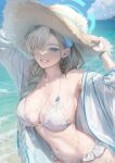  1girl asuna_(blue_archive) asymmetrical_hair beach bikini blonde_hair blue_archive blue_eyes blue_nails blue_ribbon bracelet braid breasts cleavage cloud commentary_request cropped_legs frilled_bikini frills hair_over_one_eye hair_ribbon halo hands_on_headwear hat highres huge_breasts jewelry long_hair midriff mole mole_on_breast mountain navel ocean ribbon see-through shirt single_braid sky smile sun_hat swimsuit toukaiseiya very_long_hair water waves white_bikini white_shirt 