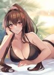  1girl bare_shoulders bikini black_bikini blurry blurry_background breasts brown_eyes brown_hair cleavage cloud collarbone cropped flower hair_between_eyes hair_flower hair_intakes hair_ornament hand_on_own_cheek hand_on_own_face high_ponytail kantai_collection kasumi_(skchkko) large_breasts long_hair looking_at_viewer lying navel on_side on_stomach outdoors palm_tree parted_lips ponytail solo sunrise swimsuit thighs tree yamato_(kancolle) 