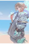  1boy absurdres beach blonde_hair blue_eyes blue_sky cowboy_shot fate/grand_order fate_(series) food hair_between_eyes hair_bun hand_in_pocket highres hiro_(hirohiro_gorira) holding holding_food holding_ice_cream hood hoodie ice_cream looking_at_viewer oberon_(fate) outdoors sand shorts sidelocks single_hair_bun sky solo standing water white_hoodie white_shorts 