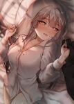  1girl 1other :d absurdres arknights bed_sheet black_gloves blush bottomless breasts cleavage collarbone collared_shirt dress_shirt fartooth_(arknights) gloves grey_hair hair_between_eyes half-closed_eyes hands_up highres kaguura_(kagu) long_hair long_sleeves lying medium_breasts naked_shirt on_back out_of_frame pillow puffy_long_sleeves puffy_sleeves shirt smile solo_focus very_long_hair white_shirt yellow_eyes 
