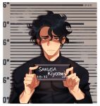  1boy barbie_mugshot_(meme) black_eyes black_hair black_shirt bombyoon closed_mouth haikyuu!! height_chart height_mark highres holding holding_sign long_sleeves looking_at_viewer male_focus meme mole_above_eye mugshot multiple_moles prisoner sakusa_kiyoomi shirt short_hair sign simple_background upper_body wavy_hair 