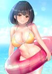  1girl bikini black_hair breasts brown_eyes cleavage cowboy_shot highres horizon innertube iwanishi large_breasts leaning_forward ocean original parted_lips short_hair side-tie_bikini_bottom smile solo standing swimsuit water yellow_bikini 