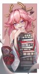  1girl animal_ears bare_shoulders blurry blurry_foreground blush book book_stack border detached_sleeves earrings floppy_ears floral_print fox_ears genshin_impact hair_between_eyes hair_ornament hand_up highres japanese_clothes jewelry looking_at_viewer nail_polish nontraditional_miko open_mouth pink_background pink_hair pink_nails purple_eyes sidelocks slow_2pin solo squiggle teeth twitter_username upper_body white_border wide_sleeves yae_miko 