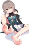  1girl arka91 bare_shoulders barefoot between_fingers breasts cleavage cleavage_cutout clothing_cutout feet foot_focus green_eyes highres holding holding_own_leg honkai:_star_rail honkai_(series) long_hair mahjong mahjong_tile qingque_(honkai:_star_rail) simple_background soles solo toes white_background 