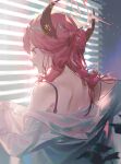  1girl aru_(blue_archive) bare_shoulders blue_archive bow fajyobore hair_bow halo highres horns leaf long_hair long_sleeves looking_down pink_hair solo strap sunlight window yellow_eyes 