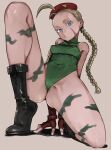  1girl abaratani_kurou ahoge bare_shoulders beret black_footwear blonde_hair blue_eyes bodypaint boots braid breasts cammy_white commentary_request fingerless_gloves full_body gloves green_leotard hat highres huge_ahoge leotard long_hair looking_at_viewer on_one_knee puckered_lips red_gloves scar scar_on_cheek scar_on_face small_breasts solo squatting street_fighter thong_leotard twin_braids 
