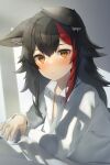  1girl animal_ear_fluff animal_ears black_hair blush commentary_request ears_down hair_between_eyes highres hololive long_sleeves looking_at_viewer multicolored_hair ookami_mio red_hair shirai_yu shirt sidelocks solo streaked_hair virtual_youtuber white_shirt wolf_ears wolf_girl yellow_eyes 