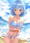  1girl bare_arms bare_legs bare_shoulders beach bikini blue_bikini blue_eyes blue_hair blush breasts cleavage collarbone cowboy_shot day fingernails hair_between_eyes heterochromia highres large_breasts looking_at_viewer navel ocean open_mouth red_eyes reijing_etrn short_hair solo swimsuit tatara_kogasa touhou water wet 