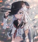  1girl absurdres anchor_symbol black_headwear blue_eyes blush closed_mouth collarbone crying crying_with_eyes_open dfd flat_cap hair_between_eyes hat hibiki_(kancolle) highres kantai_collection long_hair machinery navel neckerchief red_neckerchief rigging school_uniform serafuku solo tears torn_clothes torn_neckerchief torn_sleeves turret upper_body white_hair 