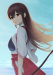  1girl akagi_(kancolle) bow_(weapon) breasts brown_eyes brown_hair day hair_between_eyes hakama hakama_skirt highres holding holding_bow_(weapon) holding_weapon japanese_clothes kantai_collection long_hair looking_at_viewer muneate outdoors porupurucha red_hakama skirt sky solo tasuki weapon 