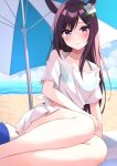  1girl alternate_costume beach blush breasts cleavage closed_mouth cloud collarbone commentary_request hair_ornament highres horse_girl looking_at_viewer mejiro_dober_(umamusume) ocean parasol purple_eyes sitting sky smile solo swimsuit swimsuit_under_clothes umamusume umbrella zeatto 
