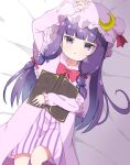  1girl bed_sheet blue_bow blush book bow crescent crescent_hat_ornament crys_(dai) dress frilled_sleeves frills hair_bow hat hat_ornament highres long_hair long_sleeves looking_at_viewer lying mob_cap on_back open_mouth patchouli_knowledge purple_dress purple_eyes purple_hair purple_headwear red_bow solo striped striped_dress touhou vertical-striped_dress vertical_stripes 