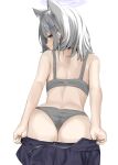  1girl absurdres animal_ear_fluff animal_ears ass blue_archive blue_eyes bra closed_mouth clothes_pull cross_hair_ornament disuto from_behind grey_bra grey_hair grey_panties hair_ornament halo highres looking_at_viewer panties purple_halo shiroko_(blue_archive) short_hair simple_background skirt skirt_pull smile solo underwear white_background 