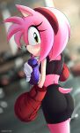  1girl amy_rose artist_name axasempai body_fur boxing_gloves eyelashes green_eyes gym headband hedgehog hedgehog_tail highres looking_back pink_fur pink_hair solo sonic_(series) sports_bra sports_drink sportswear sweat 