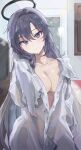  1girl black_halo blanc_(whit_blanc) blue_archive blue_eyes blue_hair breasts cleavage closed_mouth collarbone commentary_request hair_between_eyes halo highres holding holding_towel indoors looking_at_viewer medium_breasts shirt smile solo towel wet wet_clothes wet_shirt white_shirt yuuka_(blue_archive) 