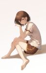  1girl barefoot black_shorts brown_eyes brown_hair closed_mouth commentary hand_on_own_leg hand_up herfstijl highres looking_at_viewer original shirt short_hair short_sleeves shorts simple_background sitting solo white_background white_shirt 