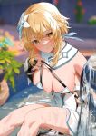 1girl blonde_hair blurry blurry_background blush breasts bridal_gauntlets cleavage detached_collar dress feather_hair_ornament feathers flower fountain genshin_impact hair_flower hair_ornament highres large_breasts leaning_forward looking_at_viewer lumine_(genshin_impact) outdoors pulled_by_self short_dress sidelocks sitting skindentation solo strap_pull takeno_omoti thighs water wet white_dress white_flower yellow_eyes 