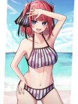  1girl absurdres animal_print beach bikini blue_eyes blue_sky blunt_bangs breasts butterfly_hair_ornament cloud collarbone day fish_print gakunning go-toubun_no_hanayome hair_ornament hair_ribbon highres horizon large_breasts medium_hair nakano_nino ocean outdoors red_hair ribbon short_hair sidelocks sky solo striped striped_bikini swimsuit two_side_up v vertical-striped_bikini vertical_stripes 