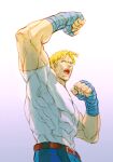  1boy arms_up bandaged_arm bandages bingoman blonde_hair cody_travers covered_abs cowboy_shot large_pectorals male_focus mature_male muscular muscular_male open_mouth pants pectorals shirt short_hair solo street_fighter taut_clothes taut_shirt thick_eyebrows 