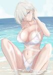  1girl absurdres beach blue_eyes blue_sky breasts cleavage cloud day feet_out_of_frame grey_hair hair_ornament hair_over_one_eye hairclip hamakaze_(kancolle) highres kantai_collection ken_(shutenndouji1) large_breasts looking_at_viewer ocean outdoors sitting sky solo water white_background white_hair 