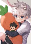  1boy animal_ears blue_eyes blush carrot_pillow character_doll closed_mouth extra_ears gon_freecss highres holding holding_pillow hunter_x_hunter killua_zoldyck layered_sleeves long_sleeves looking_at_viewer male_child male_focus object_hug pillow pillow_hug rabbit_ears shirt short_hair short_over_long_sleeves short_sleeves sitting stuffed_carrot usami_(usami_l) white_hair white_shirt 