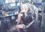  1girl barefoot black_hoodie blue_archive blush can cellphone chair green_eyes green_halo grey_hair halo hare_(blue_archive) highres hood hoodie kaerunoko keyboard_(computer) long_hair long_sleeves monitor monster_energy open_mouth phone ponytail sitting smartphone solo 