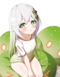 1girl bangs blush bottomless chestnut_mouth collarbone cross-shaped_pupils cushion eyelashes fazekas feet_out_of_frame from_above genshin_impact gradient_clothes gradient_hair green_eyes green_hair hair_between_eyes hair_ornament hand_on_own_knee highres legs_together long_hair looking_at_viewer multicolored_hair nahida_(genshin_impact) naked_shirt open_mouth pointy_ears shirt short_sleeves sitting solo straight_hair sweatdrop swept_bangs symbol-shaped_pupils t-shirt thighs white_hair white_shirt 