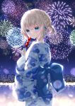  1girl aerial_fireworks back_bow blonde_hair blue_bow blue_eyes blue_hair blue_nails bow braid closed_mouth commentary_request fireworks floral_print flower food fruit hair_between_eyes hair_bun hair_flower hair_ornament holding holding_food indie_virtual_youtuber japanese_clothes kimono long_sleeves looking_at_viewer looking_to_the_side multicolored_hair nail_polish night night_sky outdoors pink_flower print_kimono signature sky skyline smile solo strawberry streaked_hair uchuuneko uchuuneko_(vtuber) water wide_sleeves yukata 