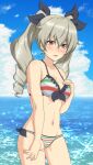  1girl ada_badguy anchovy_(girls_und_panzer) bikini blush breasts cleavage collarbone drill_hair girls_und_panzer green_hair hair_ribbon highres italian_flag_bikini large_breasts long_hair looking_at_viewer navel ocean open_mouth outdoors red_eyes ribbon shiny_skin sky solo striped striped_bikini swimsuit twin_drills 