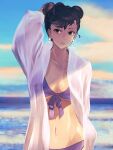  1girl arm_behind_back arm_behind_head bikini blue_sky breasts brown_eyes brown_hair chun-li cloud commentary_request cowboy_shot double_bun earrings front-tie_bikini_top front-tie_top hair_bun highres jewelry navel ocean open_clothes open_shirt outdoors shirt short_hair signature sky solo street_fighter swimsuit water white_shirt yuenibushi 