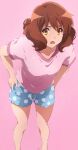  1girl absurdres blue_shorts brown_eyes brown_hair drawstring feet_out_of_frame hands_on_own_hips hibike!_euphonium highres leaning_forward medium_hair open_mouth oumae_kumiko pink_background pink_shirt polka_dot polka_dot_shorts shirt short_sleeves shorts solo thighs usagihop watermark wavy_hair 
