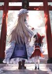  2girls aged_down blonde_hair brown_eyes brown_hair day dress hair_ribbon hakurei_reimu hat height_difference highres long_hair looking_at_another mob_cap multiple_girls outdoors profile ribbon tabard torii touhou tress_ribbon very_long_hair white_dress yakumo_yukari yamanakaume 