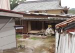  building corrugated_galvanised_iron_sheet door entrance grass mountainous_horizon no_humans original scenery tile_roof wall wooden_floor wooden_wall yk_funa 