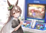  1girl aged_down amanun animal_ears arcade beetle blurry blurry_background brown_hair bug card_(medium) casual closed_mouth commentary_request hair_ornament highres holding horse_ears horse_girl long_hair mushiking satono_diamond_(umamusume) sega smile umamusume white_background yellow_eyes 