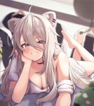  1girl ahoge animal_ears barefoot black_choker blurry blurry_background blurry_foreground blush breasts casual choker cleavage clothes_hanger commentary ear_piercing fangs full_body grey_hair grin hair_between_eyes hand_on_own_chin head_rest highres hololive lion_ears long_hair looking_at_viewer lying medium_breasts no_pants off_shoulder official_alternate_costume on_stomach piercing shirt shishiro_botan short_sleeves single_bare_shoulder smile solo ssrb_(shishiro_botan) suicabar72 t-shirt virtual_youtuber white_shirt 