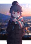  1girl absurdres blue_hair brown_coat city_lights cityscape closed_mouth coat commentary_request cowboy_shot facing_viewer hair_bun hand_in_pocket hand_up highres jacket looking_at_viewer noa_82g outside_border purple_eyes scarf shima_rin short_hair sidelocks single_hair_bun solo standing striped striped_scarf swept_bangs winter_clothes winter_coat yurucamp 