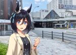  1girl abo_(hechouchou) animal_ears black_hair blue_eyes blush bob_cut casual coat collarbone eishin_flash_(umamusume) horse_ears horse_girl long_sleeves looking_at_viewer open_clothes open_coat outdoors photo_background puffy_long_sleeves puffy_sleeves smile solo umamusume upper_body 