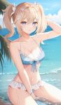  1girl alternate_costume barbara_(genshin_impact) bare_arms bare_shoulders beach bikini blonde_hair blue_bikini blue_eyes blush breasts closed_mouth commentary_request flower genshin_impact hair_flower hair_ornament highres medium_breasts nasii navel ocean smile solo stomach swimsuit twintails 