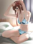  1girl adjusting_hair amami_haruka bare_legs bare_shoulders bed bed_sheet bedroom blue_bra blue_panties blurry blurry_background blush bra breasts brown_hair cleavage collarbone commentary_request commission curtains depth_of_field full_body green_eyes grey_curtains hair_ribbon highres idolmaster idolmaster_(classic) idolmaster_million_live! indoors looking_at_viewer mouth_hold navel on_bed panties partial_commentary pillow pixiv_commission red_ribbon ribbon sideways_glance sitting small_breasts solo stomach tama_(tamago) underwear underwear_only yokozuwari 